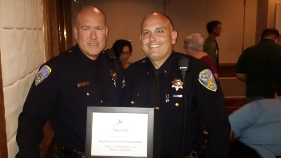 thumbnail_16-136-cmdr-robert-moser-right-ofc-sean-padilla-accepts-aascend-education-award-on-behalf-of-sfpd_435382