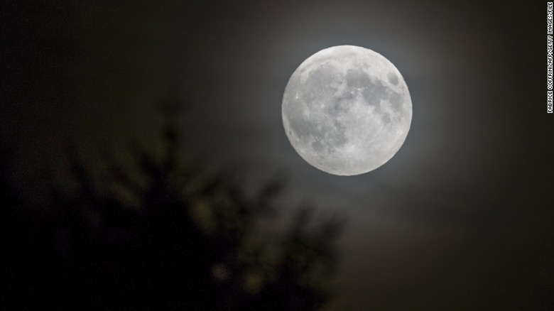 A full moon is seen in Lausanne, Switzerland, in September. Look for one on Christmas morning._292168