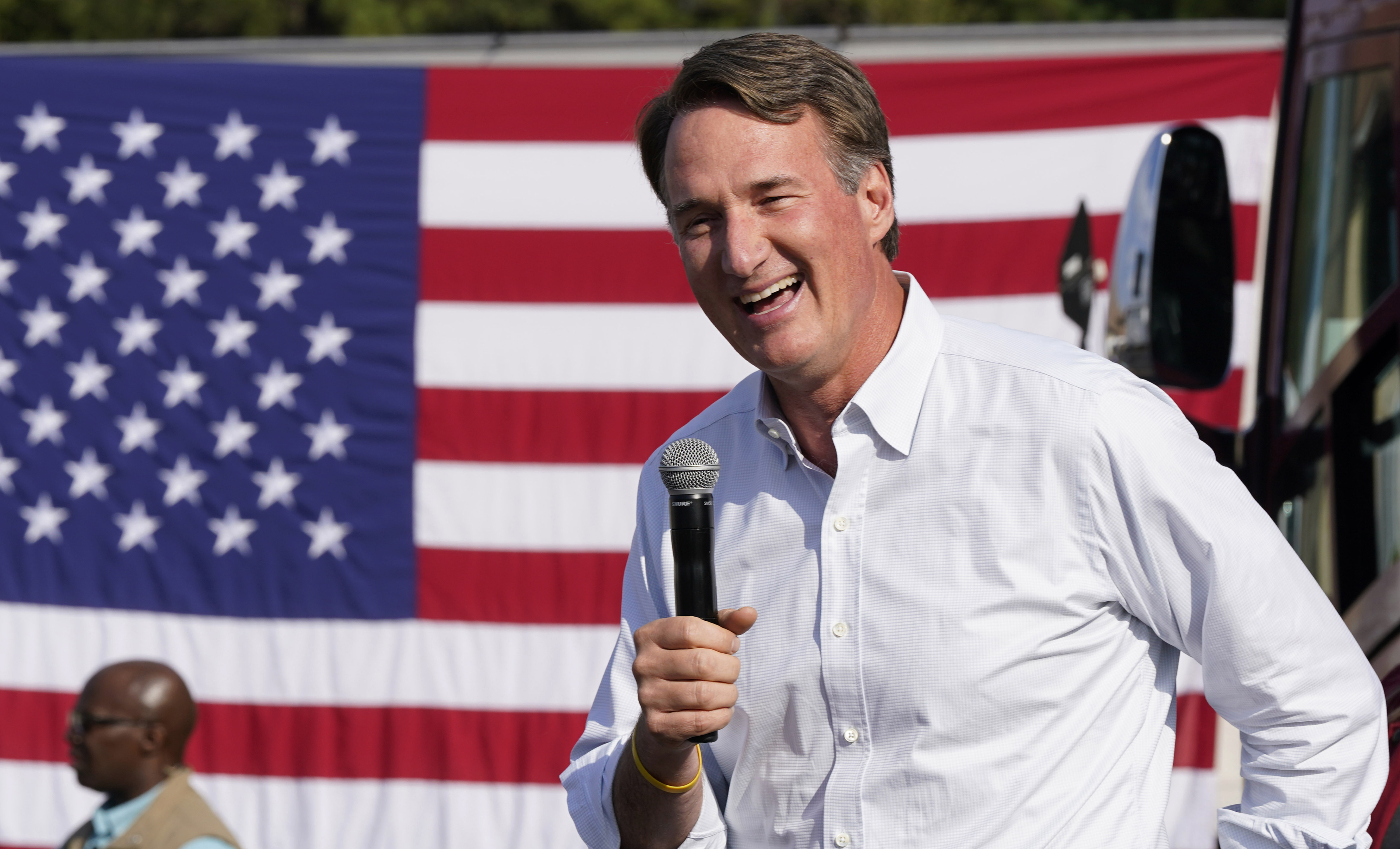 FILE - Virginia Gov. Glenn Youngkin addresses the crowd during an early voting rally, Sep. 21, 2023, in Petersburg, Va. Virginia's closely watched legislative campaign cycle closes out Tuesday, Nov. 7, as voters decide whether to empower Republicans with full state government control or let Democrats keep serving as a bulwark against Youngkin's agenda. (AP Photo/Steve Helber, File)