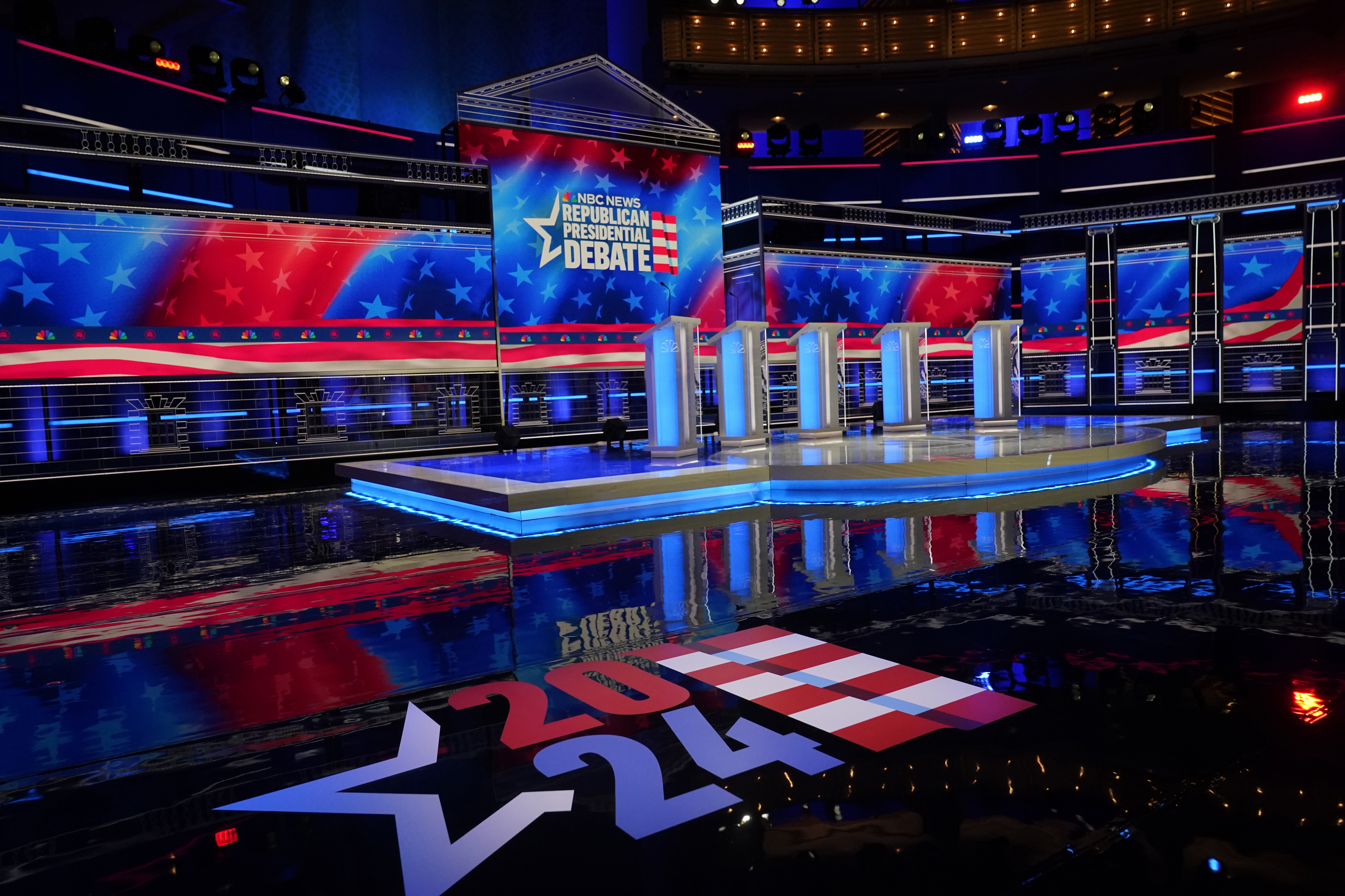 The stage is set, Tuesday, Nov. 7, 2023, for the third Republican presidential debate in Miami. Five hopefuls will participate in the debate at the Adrienne Arsht Center for the Performing Arts of Miami-Dade County, according to the Republican National Committee. They are Florida Gov. Ron DeSantis, businessman Vivek Ramaswamy, former U.N. Ambassador Nikki Haley, Sen. Tim Scott, R-S.C., and former New Jersey Gov. Chris Christie. (AP Photo/Wilfredo Lee)